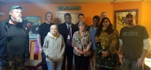 A tour of Haines Apartments with CM Sawant in attendance (middle right).