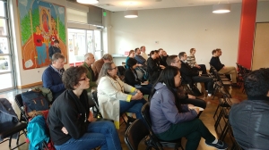 A room full of equitable transit-oriented development advocates, featuring CM Mike O'Brien (left).